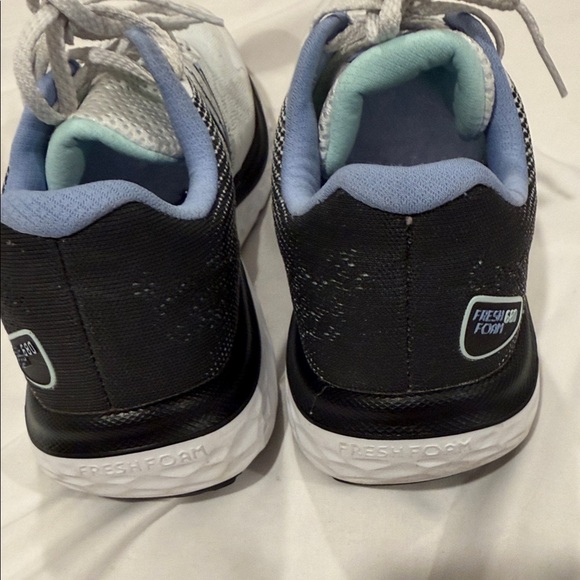 New Balance Women's White and Black Sneakers with Blue Accents - Picture 7 of 10